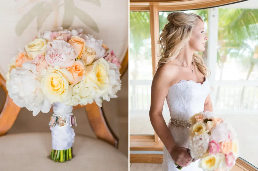 Bride holding a bouquet of pastel roses, looking out a window.